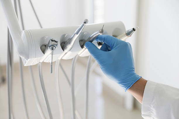 Professional Dental Veneers technician working in Central Islip, NY